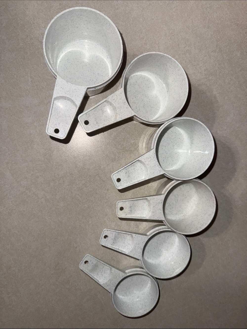Tupperware measuring cups